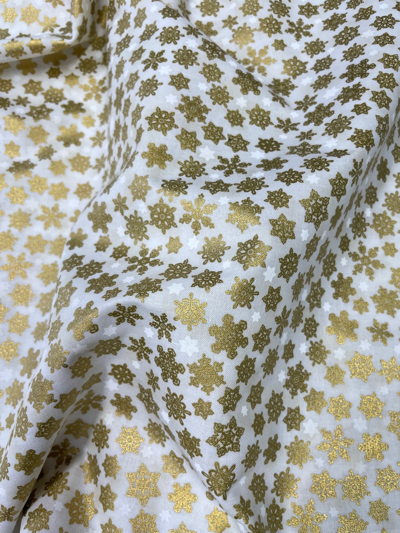 metallic gold snowflake print
