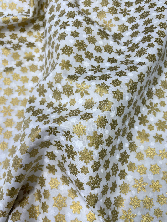 metallic gold snowflake print