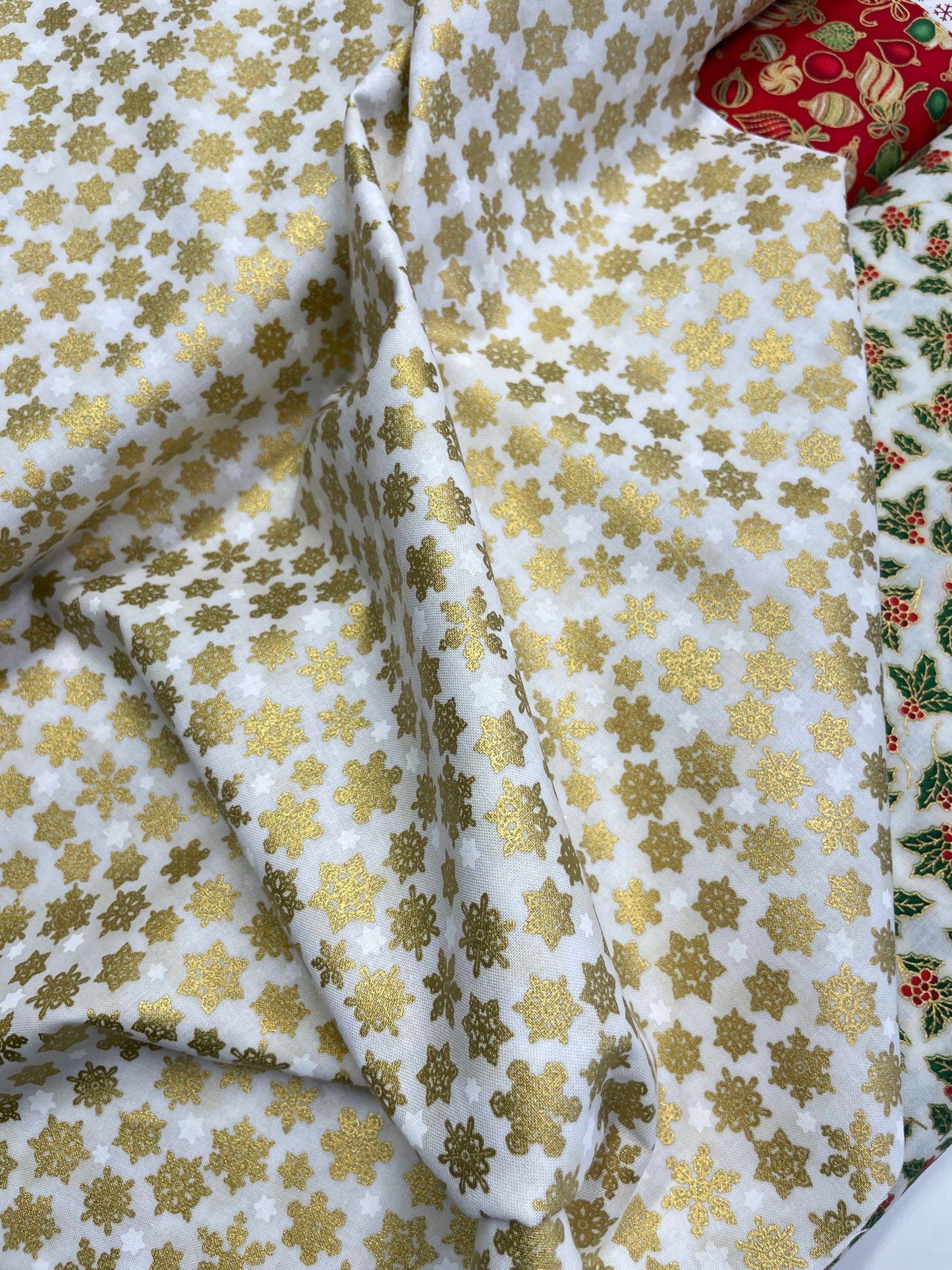 metallic gold snowflake print