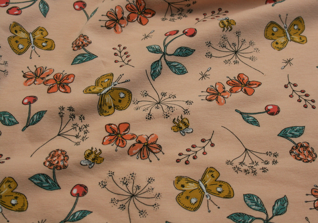 Flowers and Butterflies on Peach - Cotton Jersey